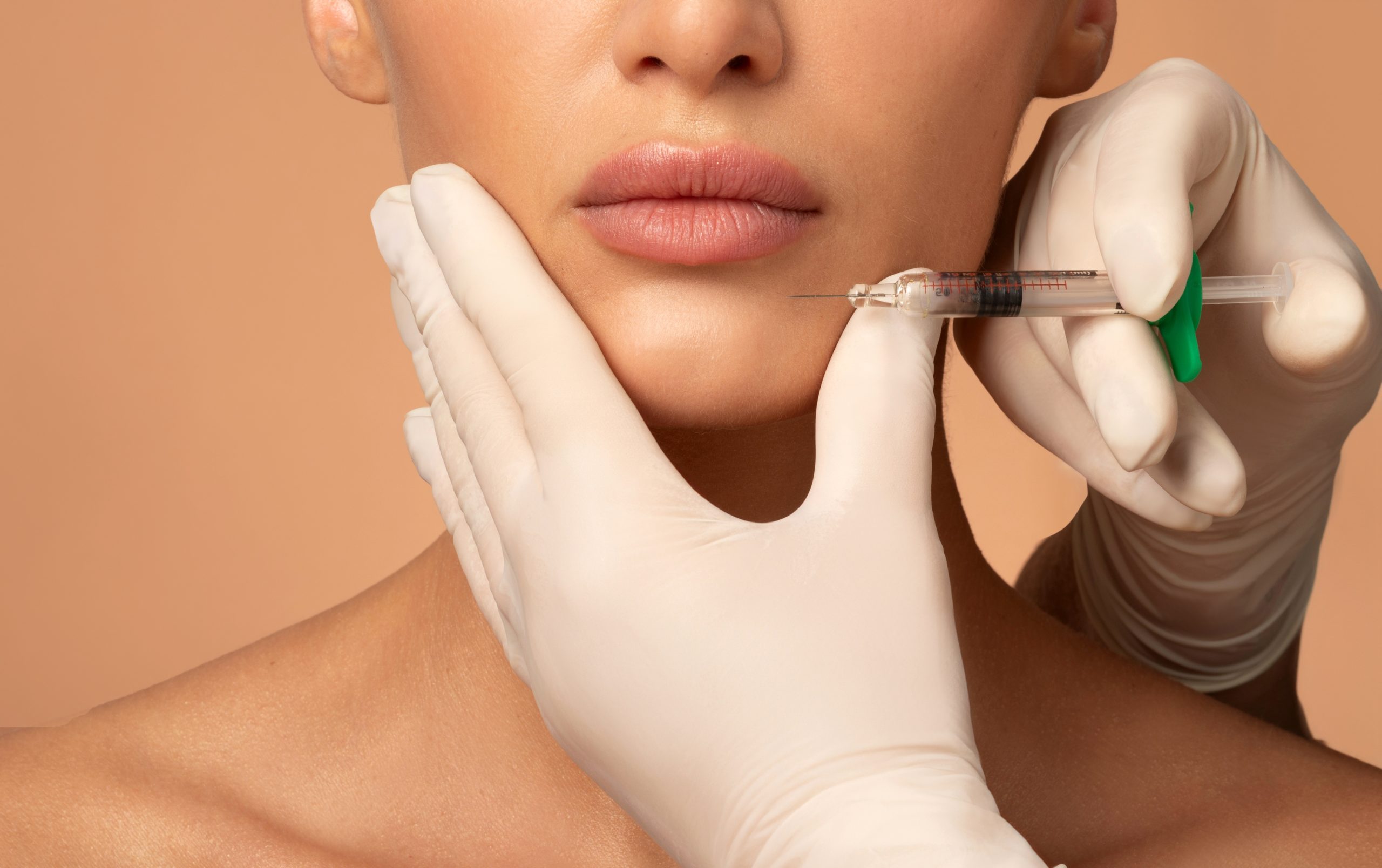 Woman,Receiving,Beauty,Injections,With,Fillers,For,Chin,Shape,Correction,